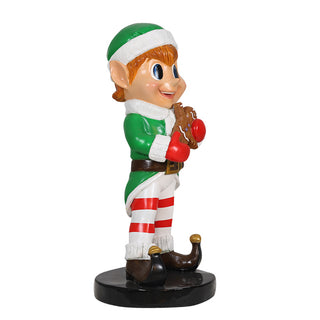 Elf Boy Holding Gingerbread